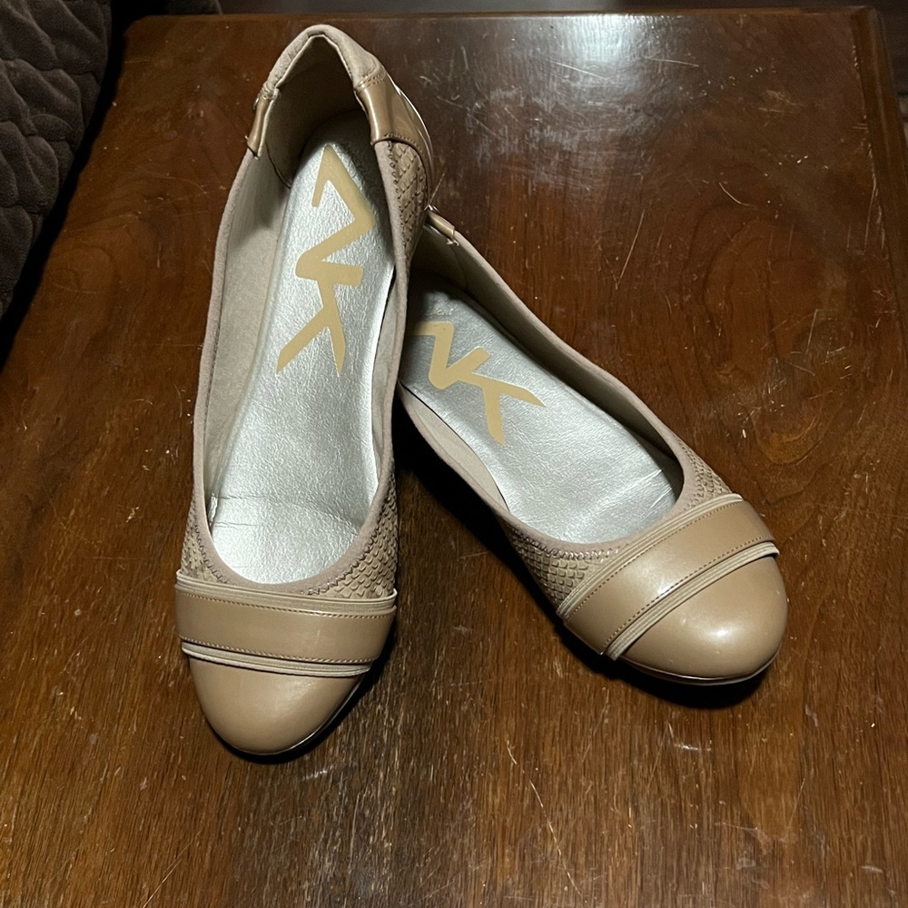 Anne Klein slip-ons. Gently used. Nude or Sand color- Size 9